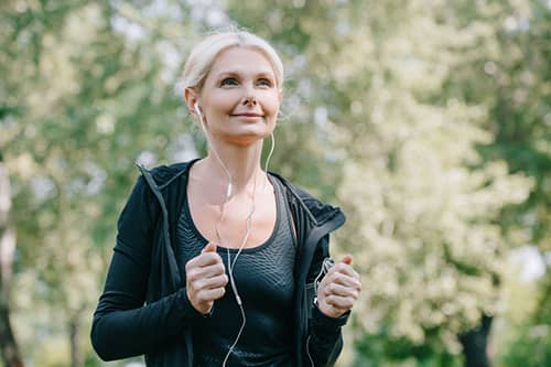 Woman jogging in a park area